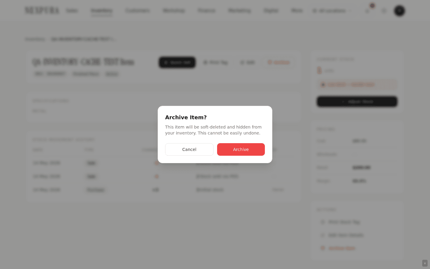 The archive confirmation modal on an item detail page. Note the wording: soft-deleted, hidden from inventory, cannot be easily undone.
